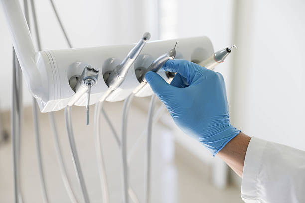 Professional Tooth Extraction technician working in Glen Ellyn, IL
